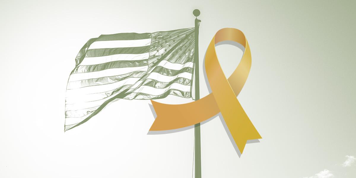 Yellow ribbon overlaying an image of the American flag